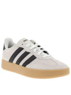 Baskets tennis beiges en cuir avec un talon plat et des lacets