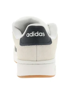 Baskets tennis blanches en cuir avec un talon plat et des lacets