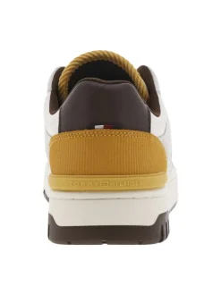 Baskets tennis blanches en cuir à semelle marron avec talon plat et logo embossé
