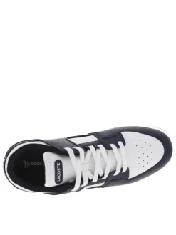 Baskets tennis blanches et marine plates et à lacets plats blancs
