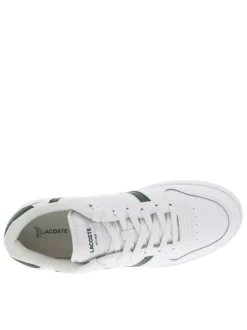Baskets tennis blanches et vertes plates avec des lacets plats