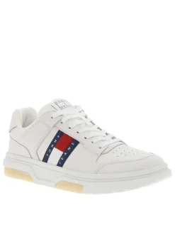 Baskets tennis blanches plates avec lacets blancs et logo de la marque en relief