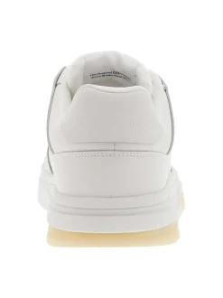 Baskets tennis blanches plates avec lacets blancs et logo de la marque en relief