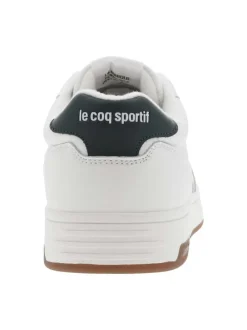 Baskets tennis blanches à talon plat et à lacets plats et logo vert