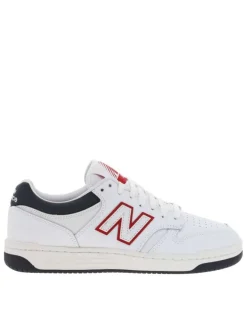 Baskets tennis en cuir blanc avec monogramme rouge à talon plat et à lacets