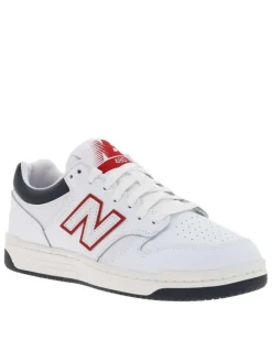 Baskets tennis en cuir blanc avec monogramme rouge à talon plat et à lacets
