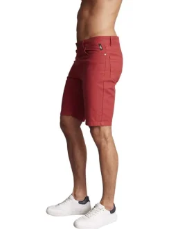 Bermuda 5 poches en coton rouge brique uni à coupe slim fit avec des passants