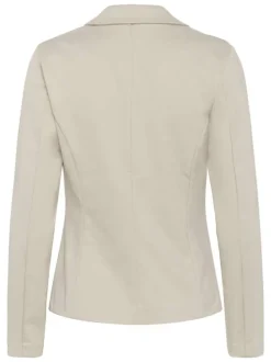 Blazer beige uni pourvu d'une coupe ajustée et d'un col à revers