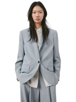 Blazer bleu gris uni avec une coupe droite et des manches longues