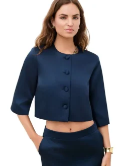 Blazer court marine uni avec une coupe droite et un col à revers