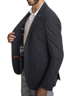 Blazer marine à coupe ajustée pourvu d'un col tailleur et de manches longues