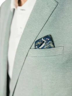 Blazer vert en maille fine avec une coupe ajustée et des poches