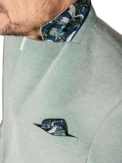 Blazer vert en maille fine avec une coupe ajustée et des poches