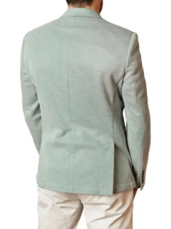 Blazer vert en maille fine avec une coupe ajustée et des poches