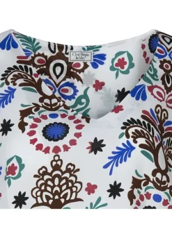 Blouse blanche imprimée abstrait sans manches avec une coupe droite