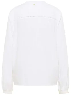 Blouse blanche unie avec un col tunisien et des manches longues