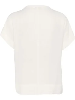 Blouse blanche unie pourvue d'un col tunisien et de manches courtes