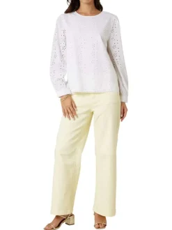 Blouse blanche unie pourvue d'une coupe droite et d'un col rond