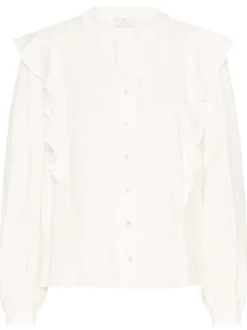 Blouse blanche unie pourvue d'une coupe droite et d'un col tunisien