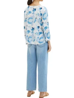 Blouse bleue imprimée avec une coupe droite col v et manches longues