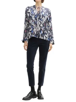 Blouse bleue à motif abstrait avec une coupe droite fluide et à manches longues