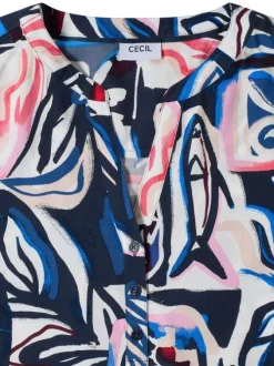 Blouse bleue à motifs avec une coupe droite et un col tunisien