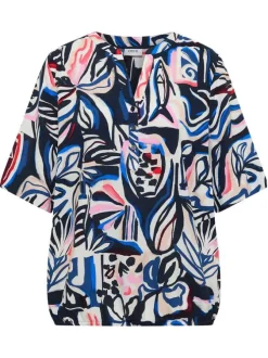 Blouse bleue à motifs avec une coupe droite et un col tunisien