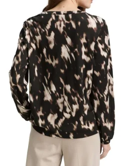Blouse chocolat ornée d'un motif fantaisie et d'un col tunisien