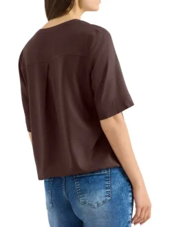 Blouse chocolat unie pourvue de manches courtes et d'un col tunisien
