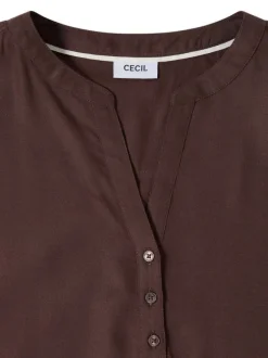 Blouse chocolat unie pourvue de manches courtes et d'un col tunisien