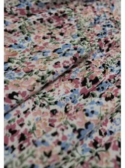 Blouse écrue liberty coupe droite avec un col rond et des manches ballons