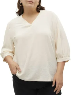 Blouse écrue unie avec une coupe droite fluide un col v et des manches 3/4