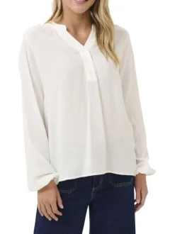 Blouse écrue unie pourvue d'une coupe droite et d'un col tunisien