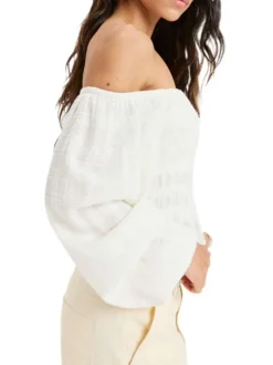 Blouse en coton blanche en maille effet gaufrée à coupe droite avec un col rond