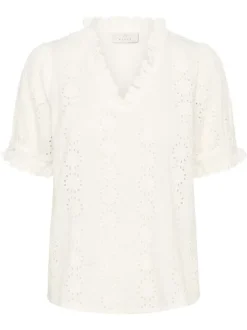 Blouse en coton blanche unie pourvue d'une coupe droite et d'un col v