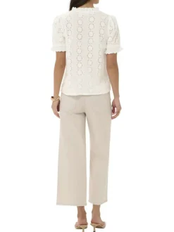 Blouse en coton blanche unie pourvue d'une coupe droite et d'un col v