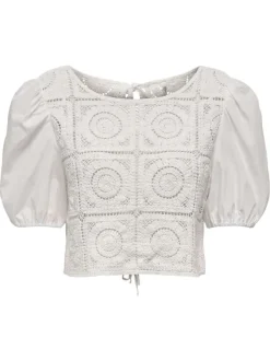 Blouse en coton écrue unie en crochet à coupe crop top avec des lacets au dos