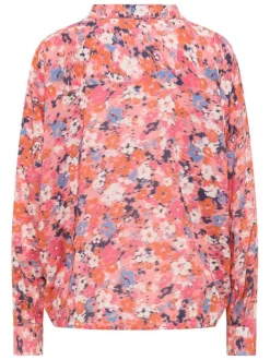 Blouse en coton rose fleurie avec une coupe fluide et un col v à revers