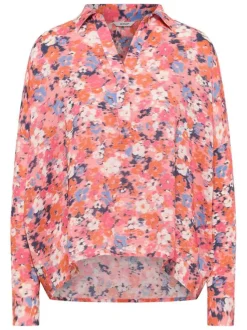 Blouse en coton rose fleurie avec une coupe fluide et un col v à revers