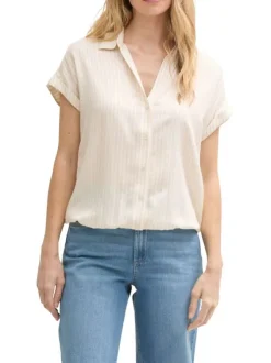 Blouse manches courtes beige rayée avec col v profond et une coupe loose fit