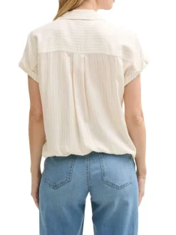 Blouse manches courtes beige rayée avec col v profond et une coupe loose fit