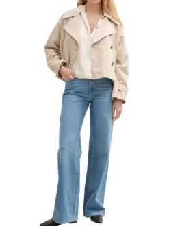 Blouse manches courtes beige rayée avec col v profond et une coupe loose fit