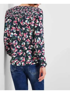 Blouse marine fleurie avec une coupe droite col v et à manches longues