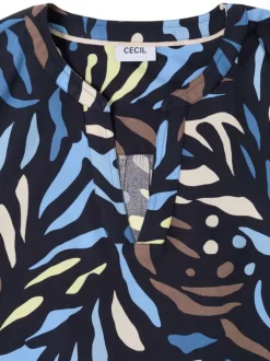 Blouse marine à motifs pourvue de manches longues et d'un col tunisien