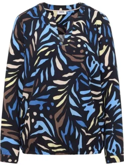 Blouse marine à motifs pourvue de manches longues et d'un col tunisien