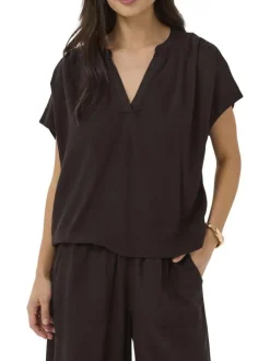Blouse marron unie pourvue d'un col tunisien et de manches courtes