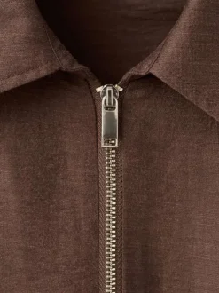 Blouse marron unie pourvue d'une coupe droite et de manches courtes