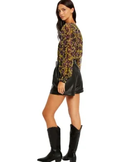 Blouse multicolore moucheté à coupe péplum col v et à manches longues