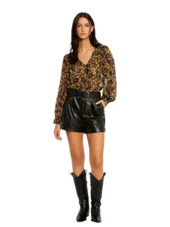 Blouse multicolore moucheté à coupe péplum col v et à manches longues