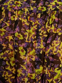 Blouse multicolore moucheté à coupe péplum col v et à manches longues